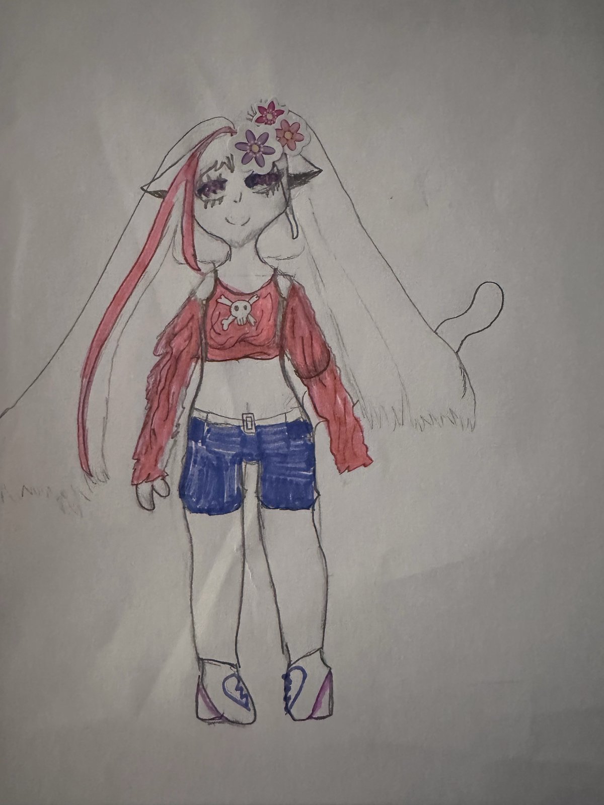 A pencil drawing of a girl with long hair, flower clips, a red top with a skull on it, blue shorts and a tail.